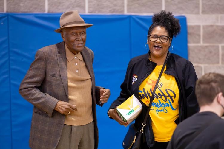 Jannette Berkley-Patton and Alvin Brooks stand together and talk